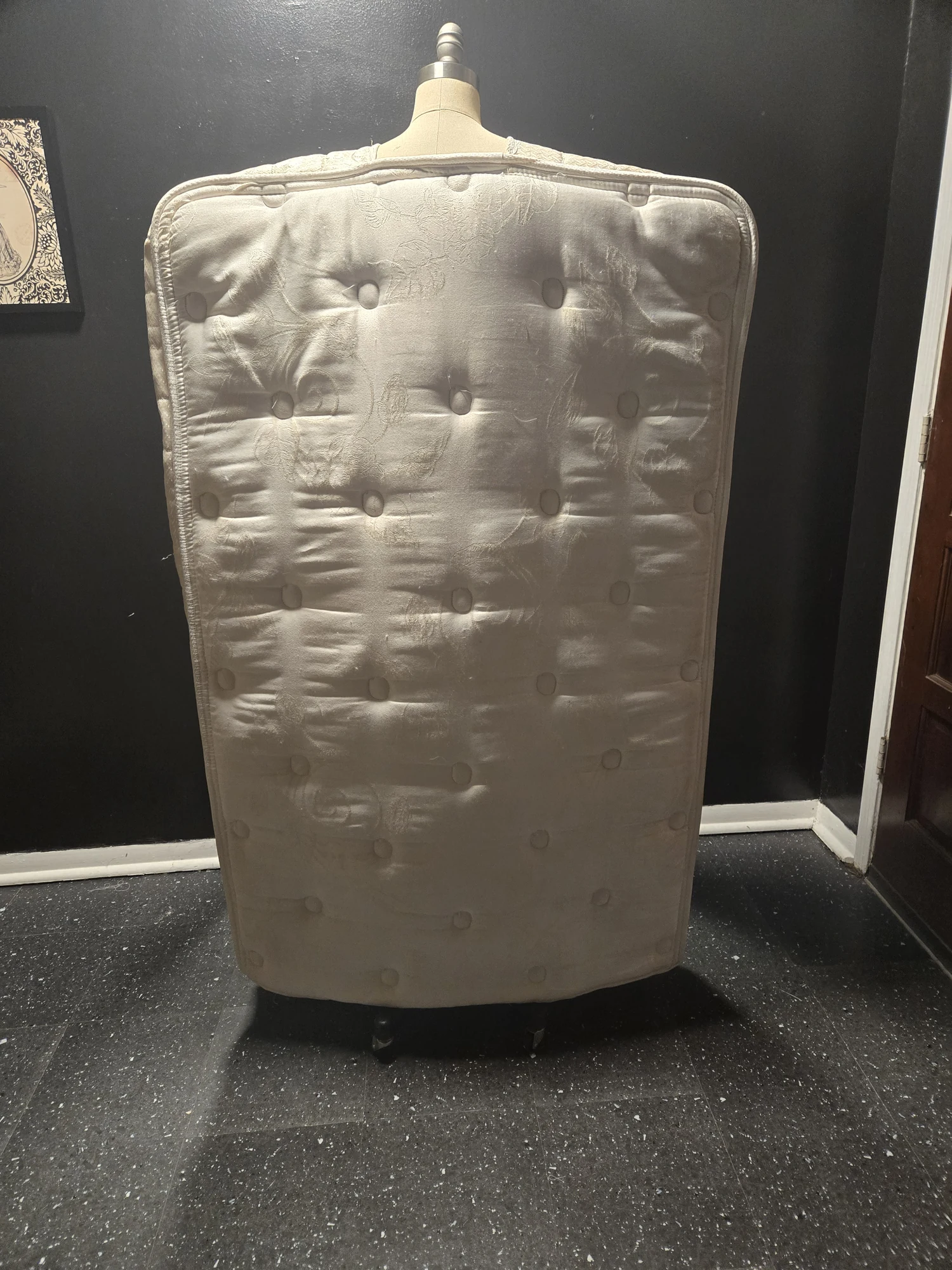 Silver quilted specialty costume piece during construction