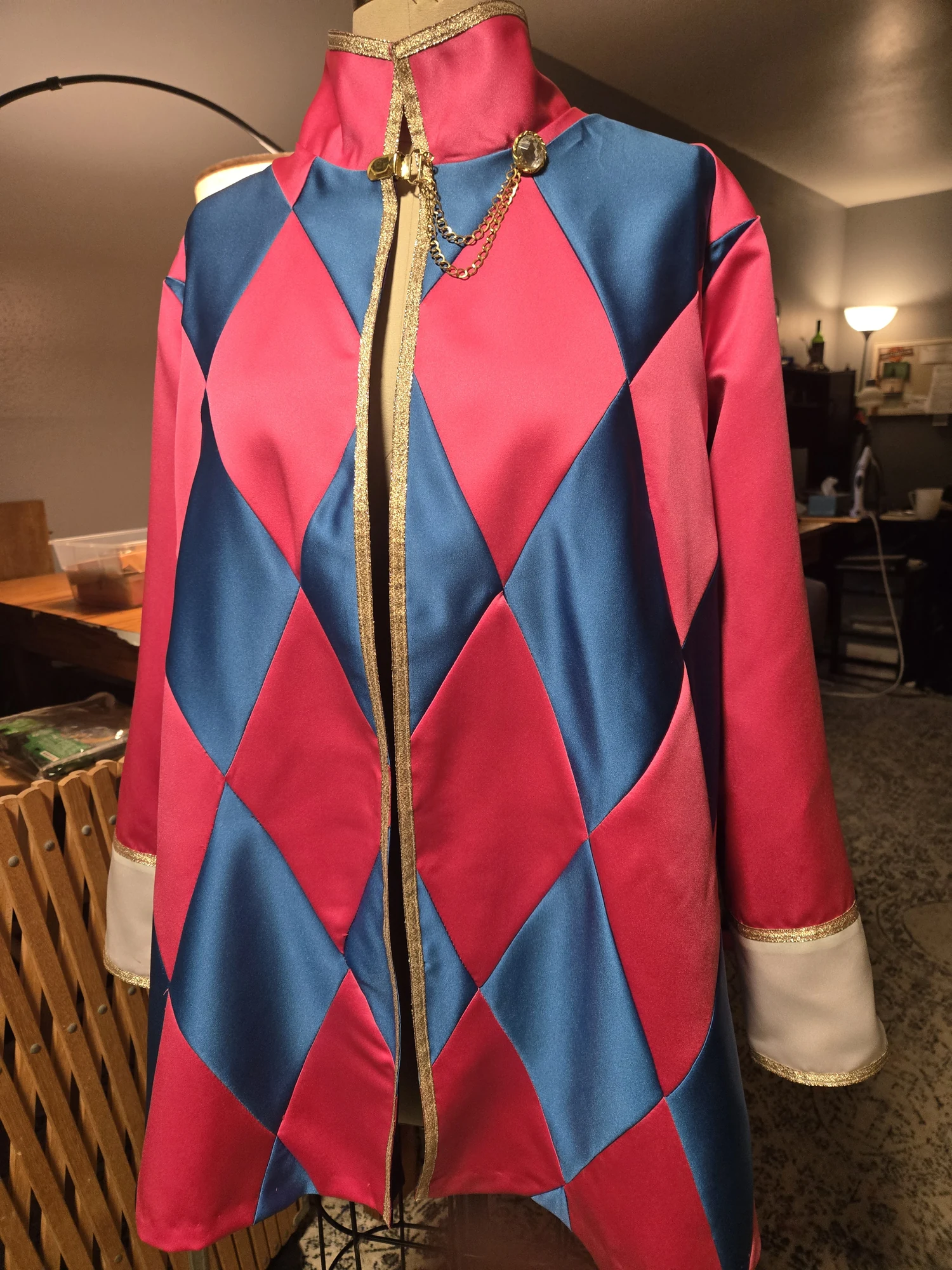 Red and blue diamond-patterned costume piece in progress